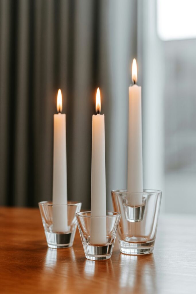 4. Glass Candle Holders for a Soft Glow